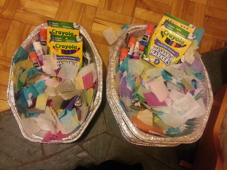 Our materials - markers, glue sticks, scrap paper, and cardboard mask bases (they're on the bottom, you can't see them), passed out to 6 tables in less than 30 seconds. They're also stackable and carried easily between classes.