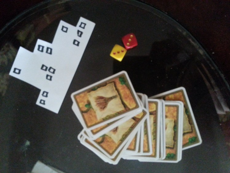 Resource cards, dice, city.